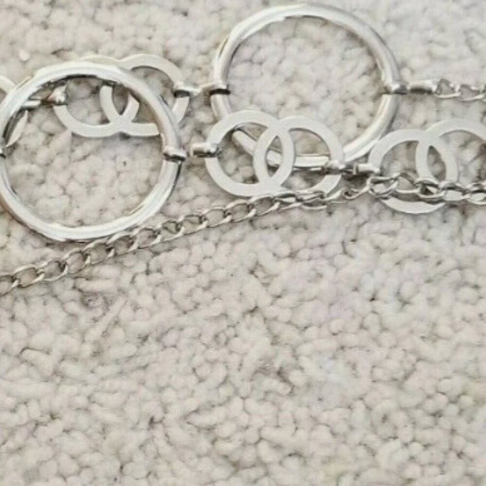 Metal accent adjustable silver circles belt women's junior's